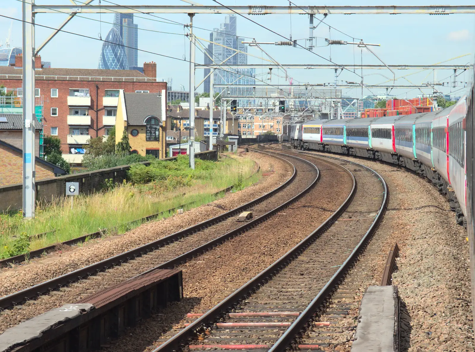 The multi-liveried train snakes into London, from A Trip to Pizza Pub, Great Suffolk Street, Southwark - 8th July 2014