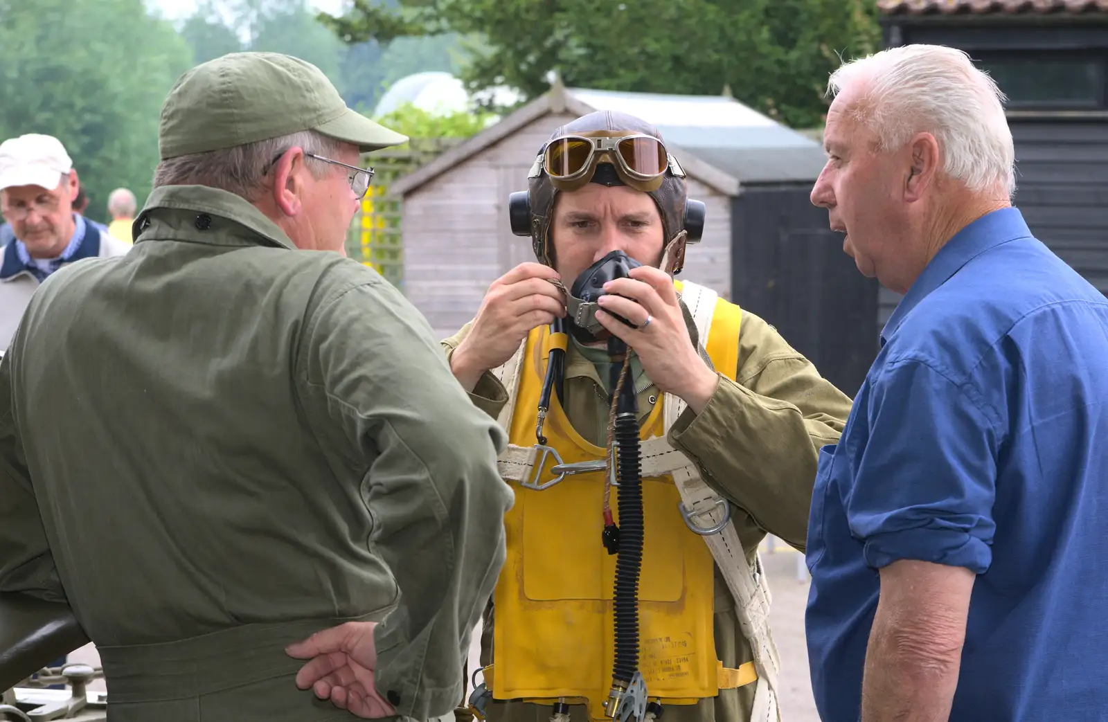 Clive tests his oxygen mask, from St. Peter and St. Paul's School Summer Fete, Eye, Suffolk - 12th July 2014