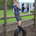 Fred swings about on a tyre, St. Peter and St. Paul's School Summer Fete, Eye, Suffolk - 12th July 2014
