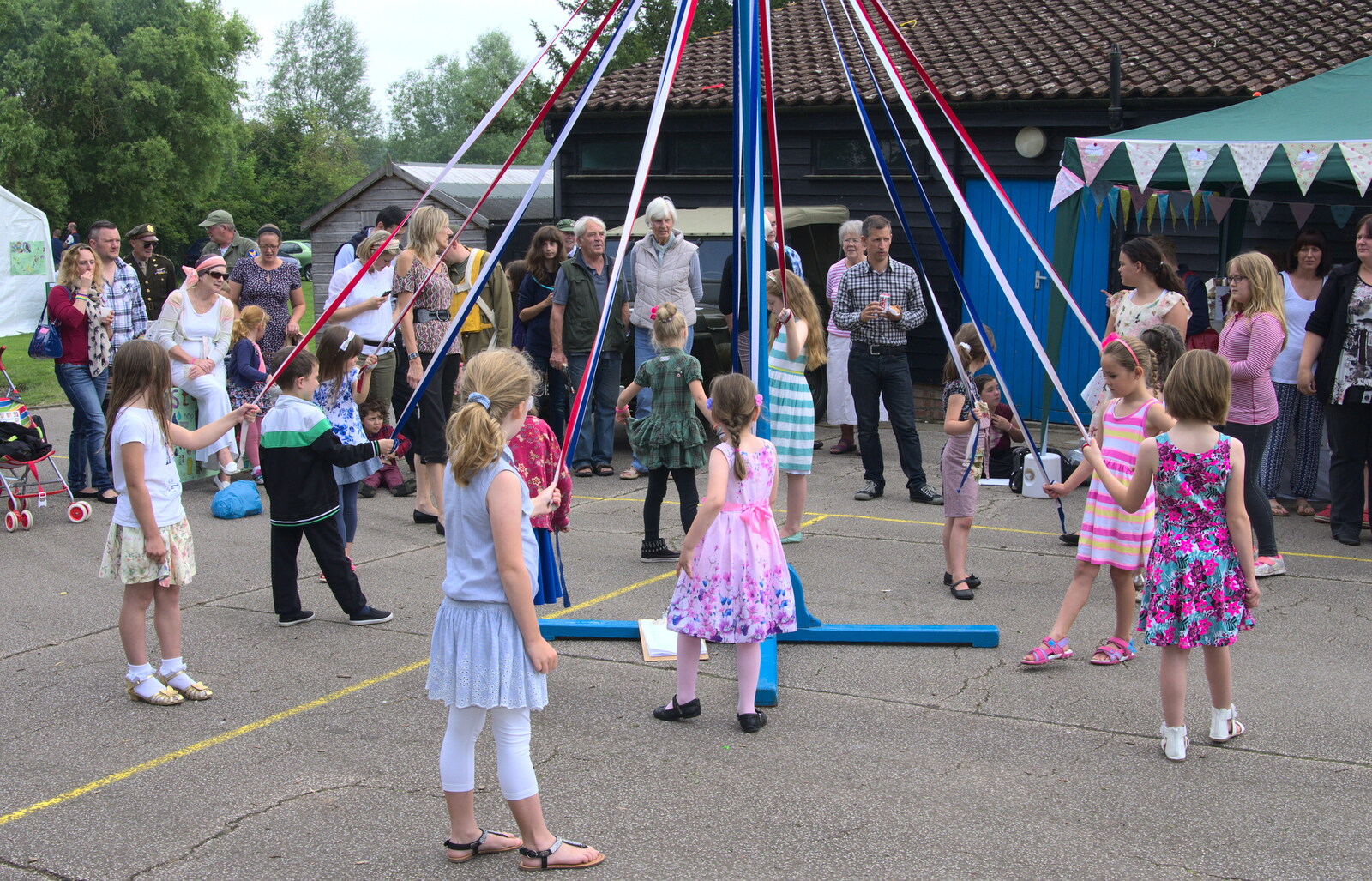 Children do a maypole thing from St. Peter and St. Paul's School Summer Fete, Eye, Suffolk - 12th July 2014