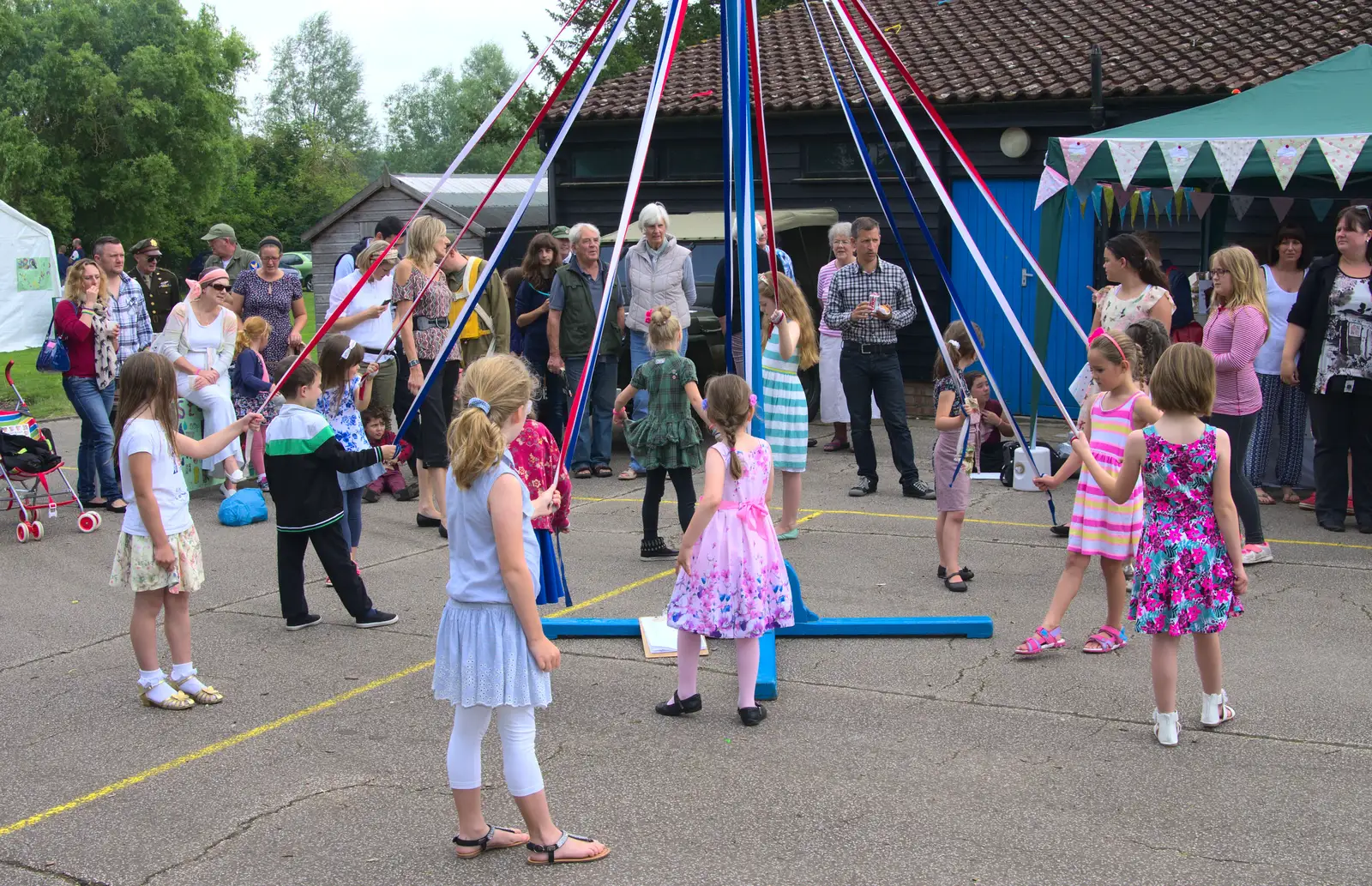 Children do a maypole thing, from St. Peter and St. Paul's School Summer Fete, Eye, Suffolk - 12th July 2014