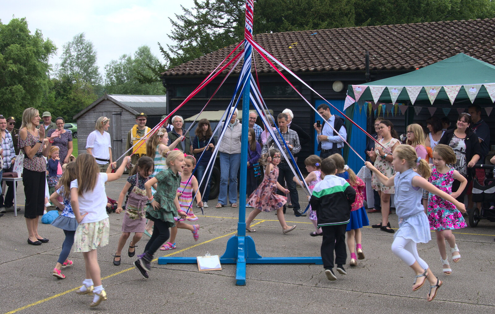 The maypole tangling gets a bit more complicated from St. Peter and St. Paul's School Summer Fete, Eye, Suffolk - 12th July 2014