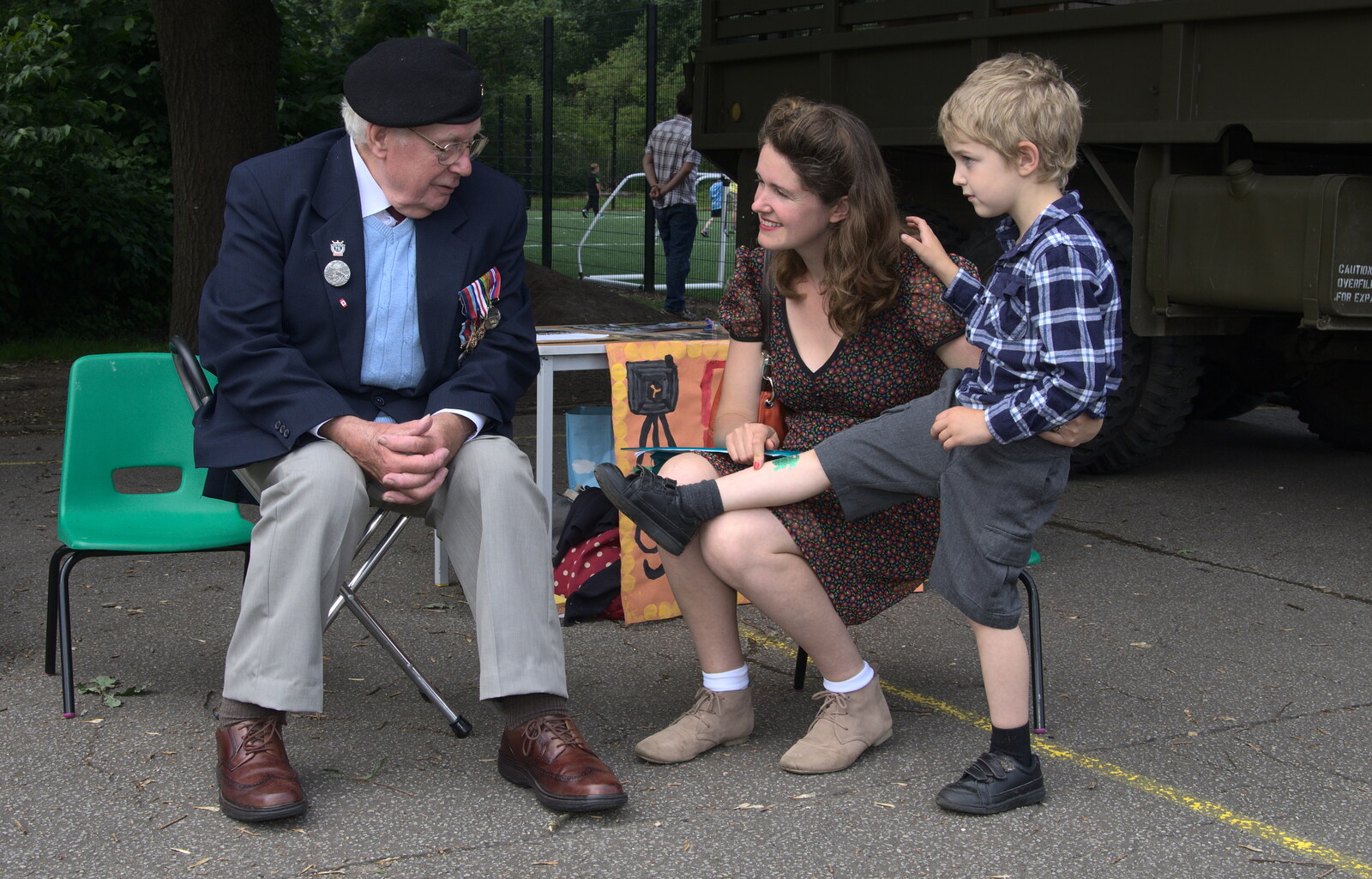Fred shows off his shin tatoo to Alan King from St. Peter and St. Paul's School Summer Fete, Eye, Suffolk - 12th July 2014
