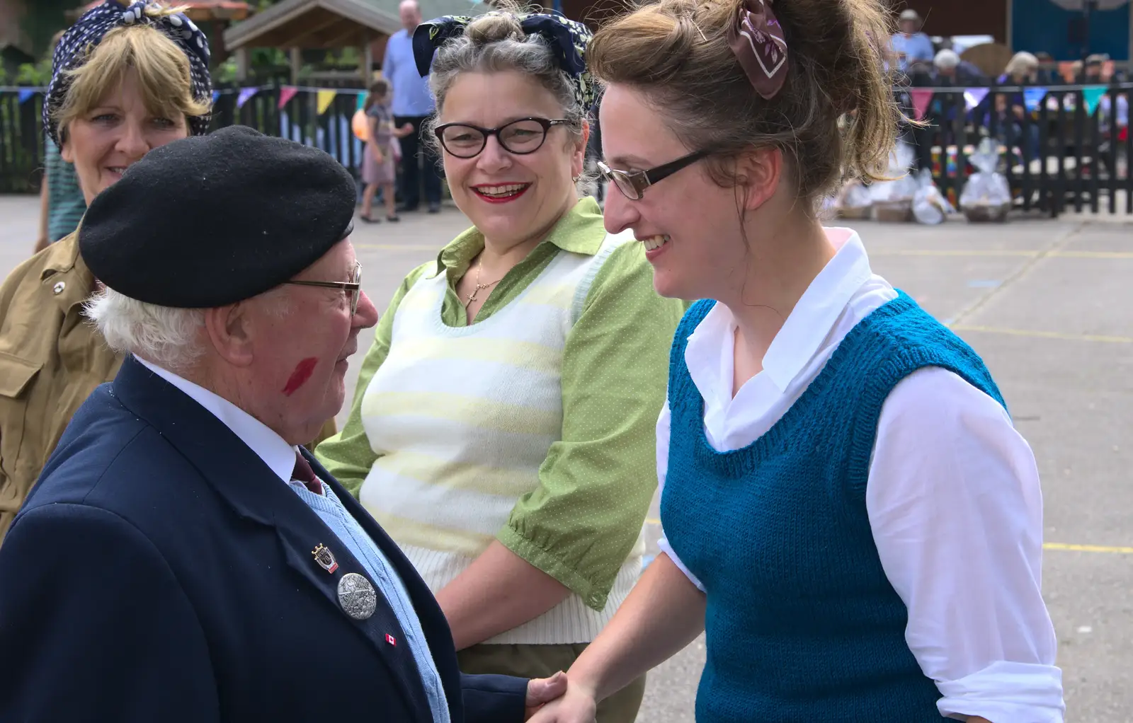 Alan King gets a splash of bright red lipstick, from St. Peter and St. Paul's School Summer Fete, Eye, Suffolk - 12th July 2014