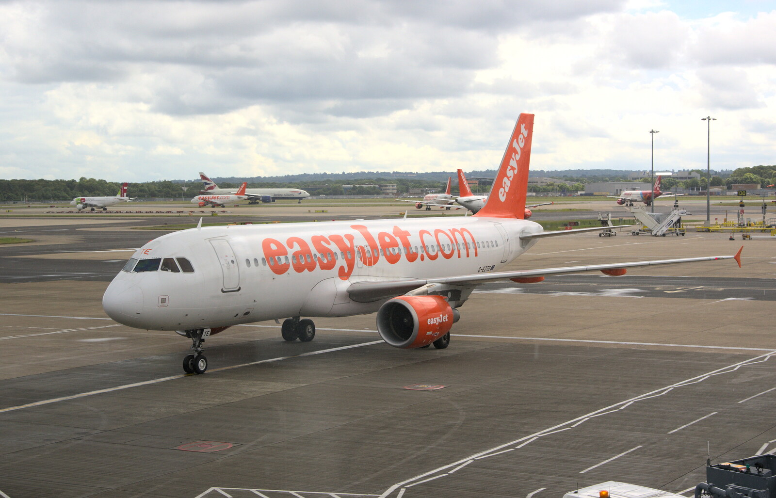 An easyJet 737 taxis around from The Open Education Challenge, Barcelona, Catalonia - 13th July 2014