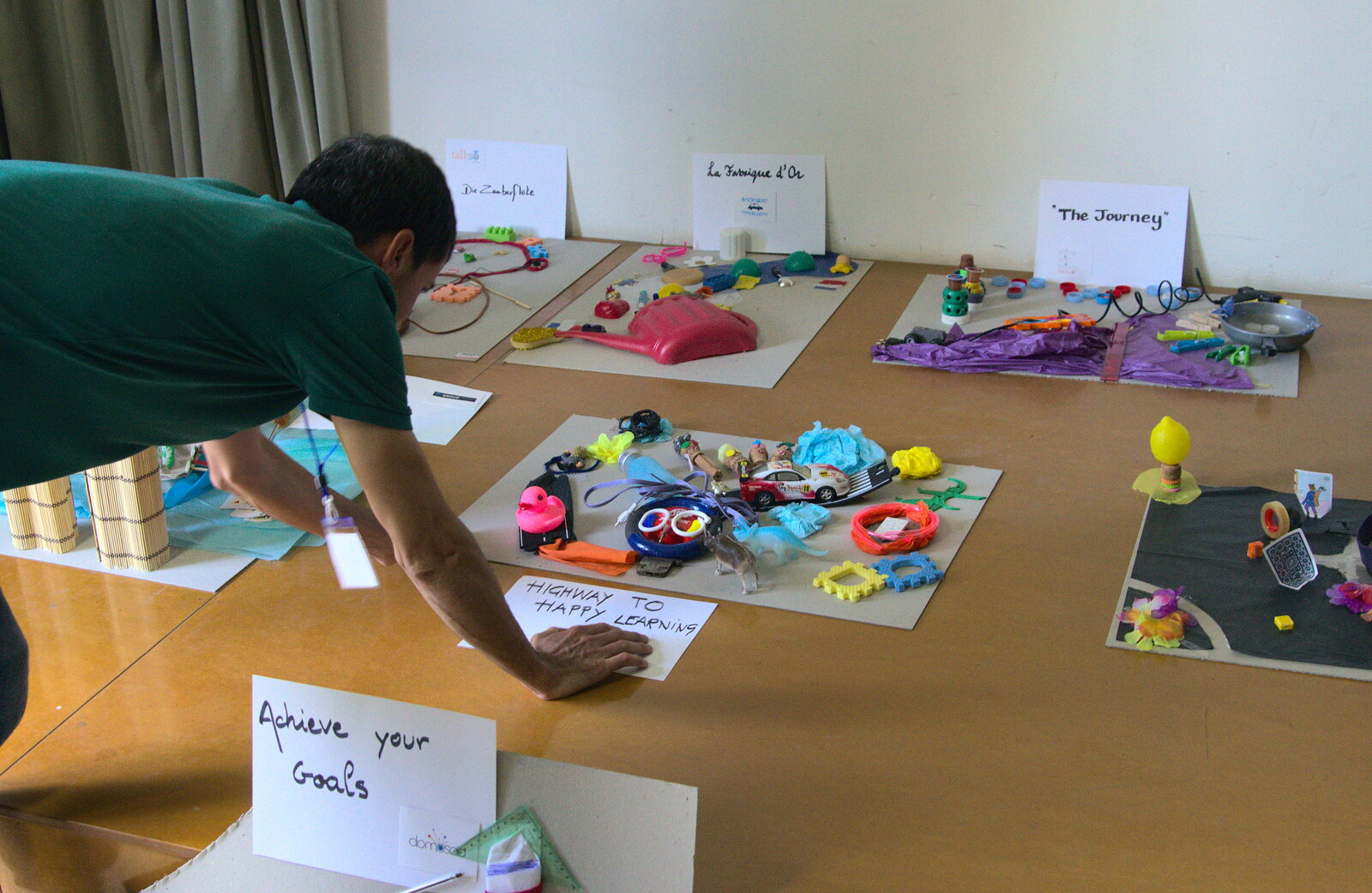 Pictures are laid out on the stage from The Open Education Challenge, Barcelona, Catalonia - 13th July 2014