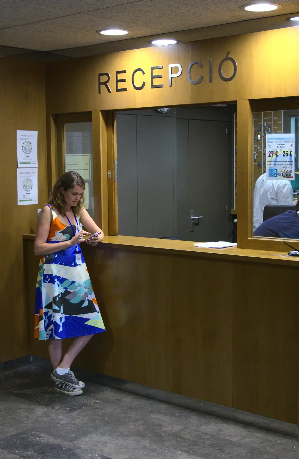 Isobel waits at reception to check out, from The Open Education Challenge, Barcelona, Catalonia - 13th July 2014