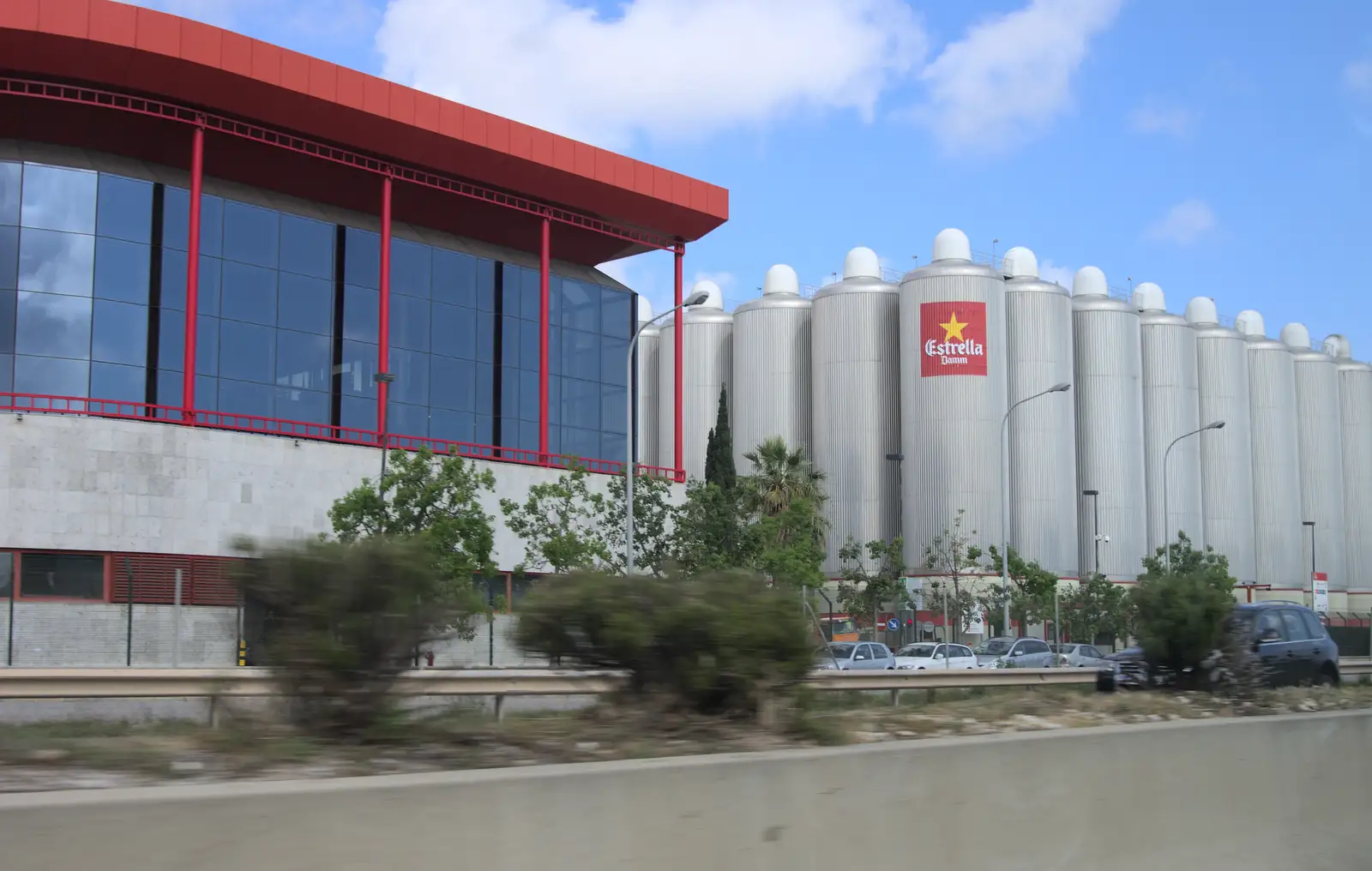 Near the airport, it's the Estralla Damm brewery, from The Open Education Challenge, Barcelona, Catalonia - 13th July 2014