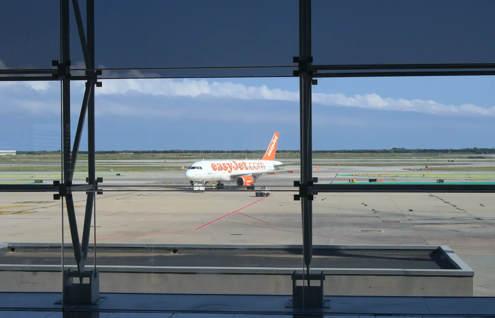 A Sleazyjet 737-800 on its own on the tarmac, from The Open Education Challenge, Barcelona, Catalonia - 13th July 2014