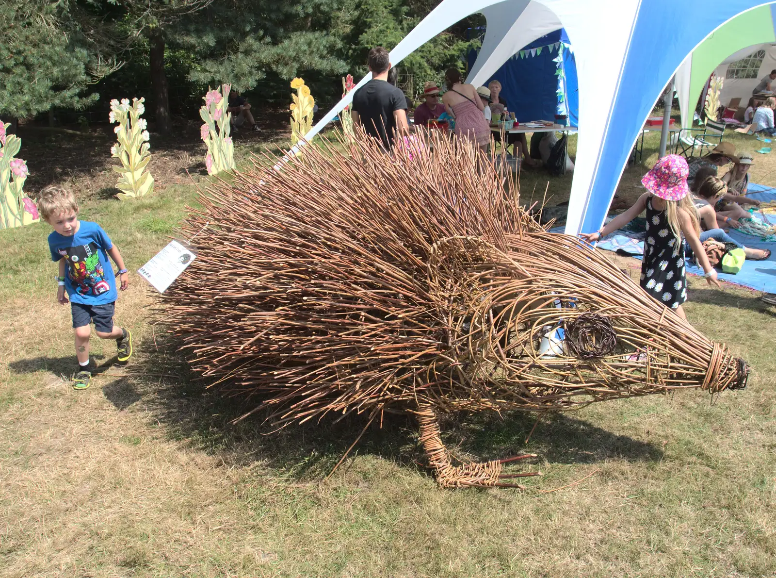 Fred inspects a large spiky hedgehog, from Latitude Festival, Henham Park, Southwold, Suffolk - 17th July 2014