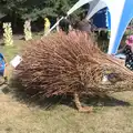 Fred inspects a large spiky hedgehog, Latitude Festival, Henham Park, Southwold, Suffolk - 17th July 2014