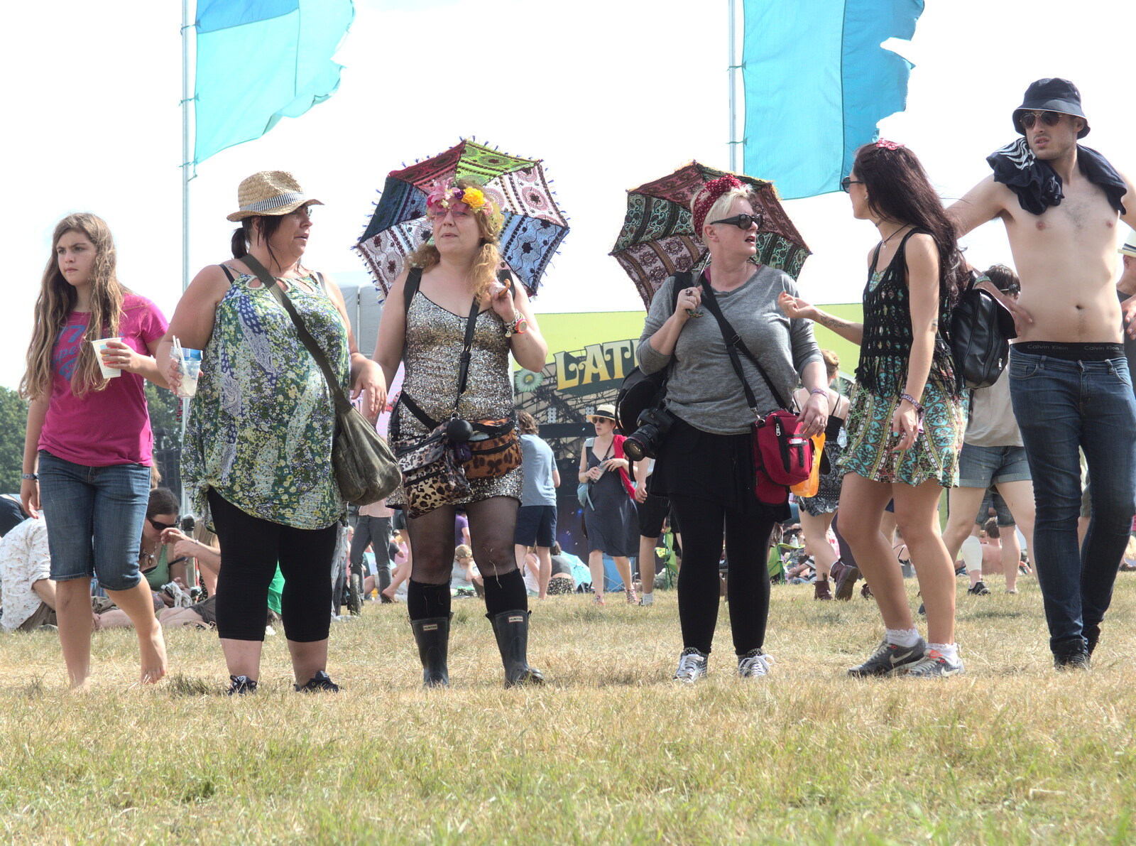 Festival goers from Latitude Festival, Henham Park, Southwold, Suffolk - 17th July 2014