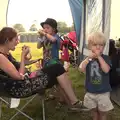 The boys eat squeezy yoghurts back at the tent, Latitude Festival, Henham Park, Southwold, Suffolk - 17th July 2014