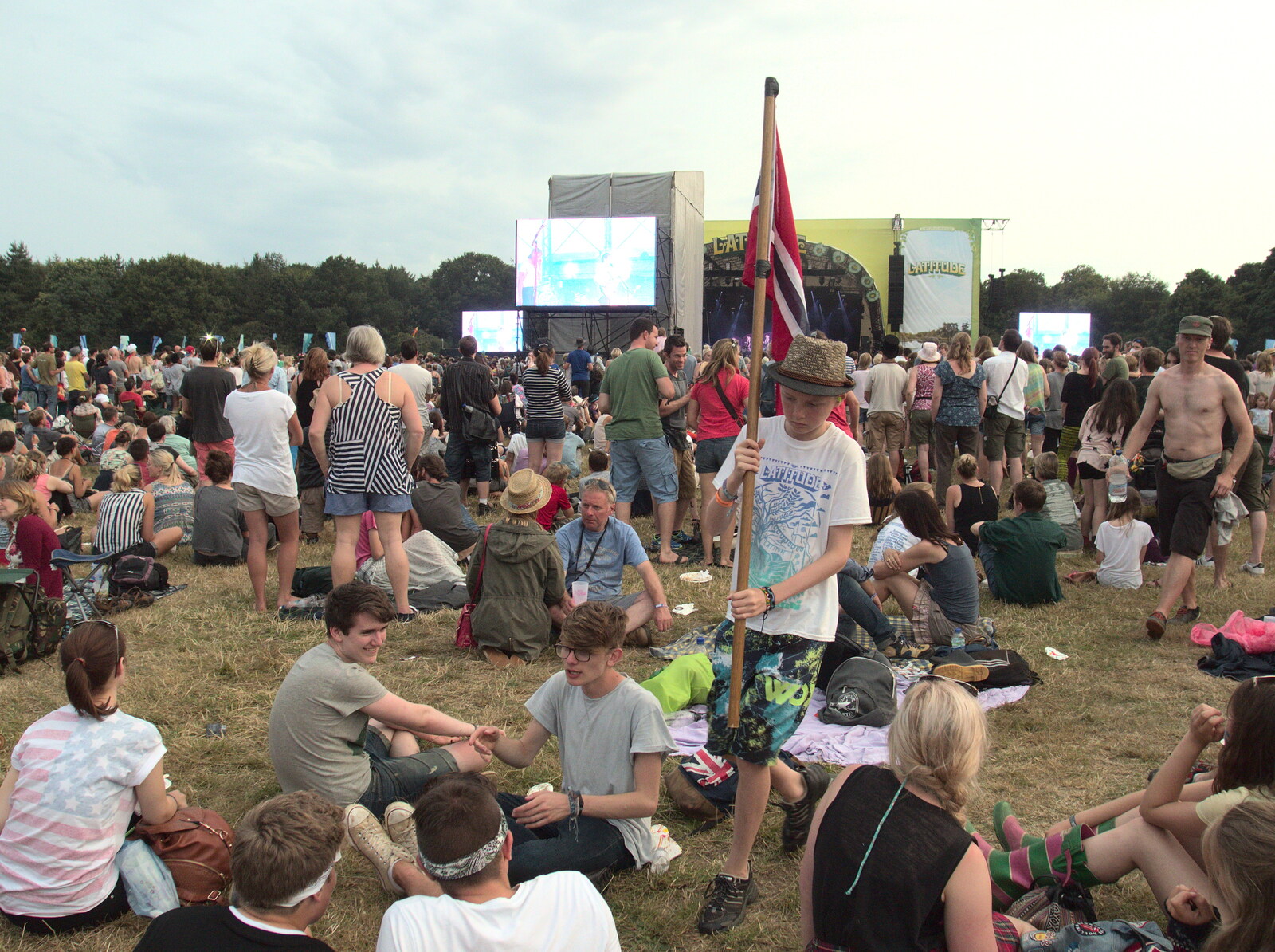 Boy with a flag from Latitude Festival, Henham Park, Southwold, Suffolk - 17th July 2014