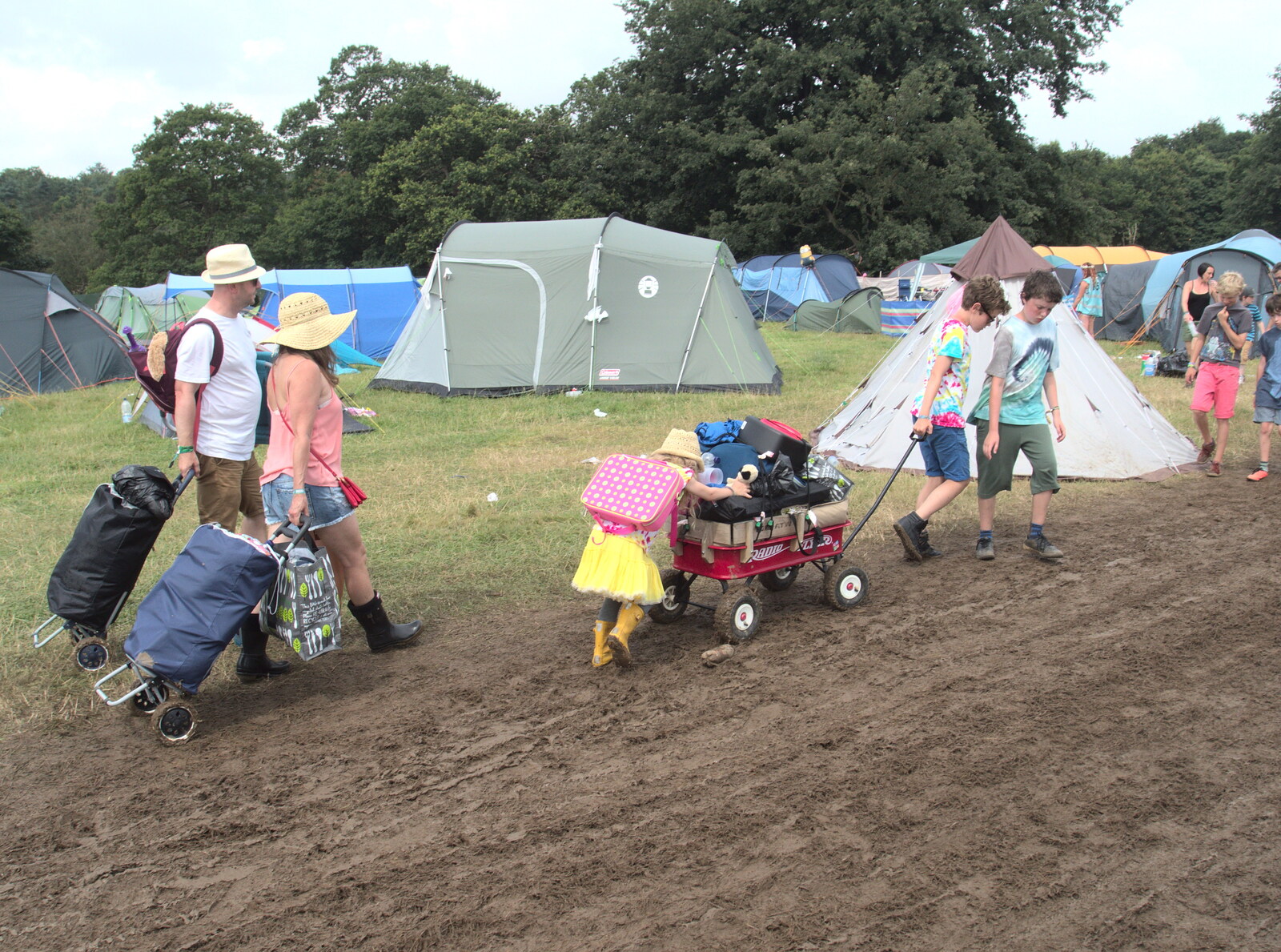 Some people make a break for it from Latitude Festival, Henham Park, Southwold, Suffolk - 17th July 2014