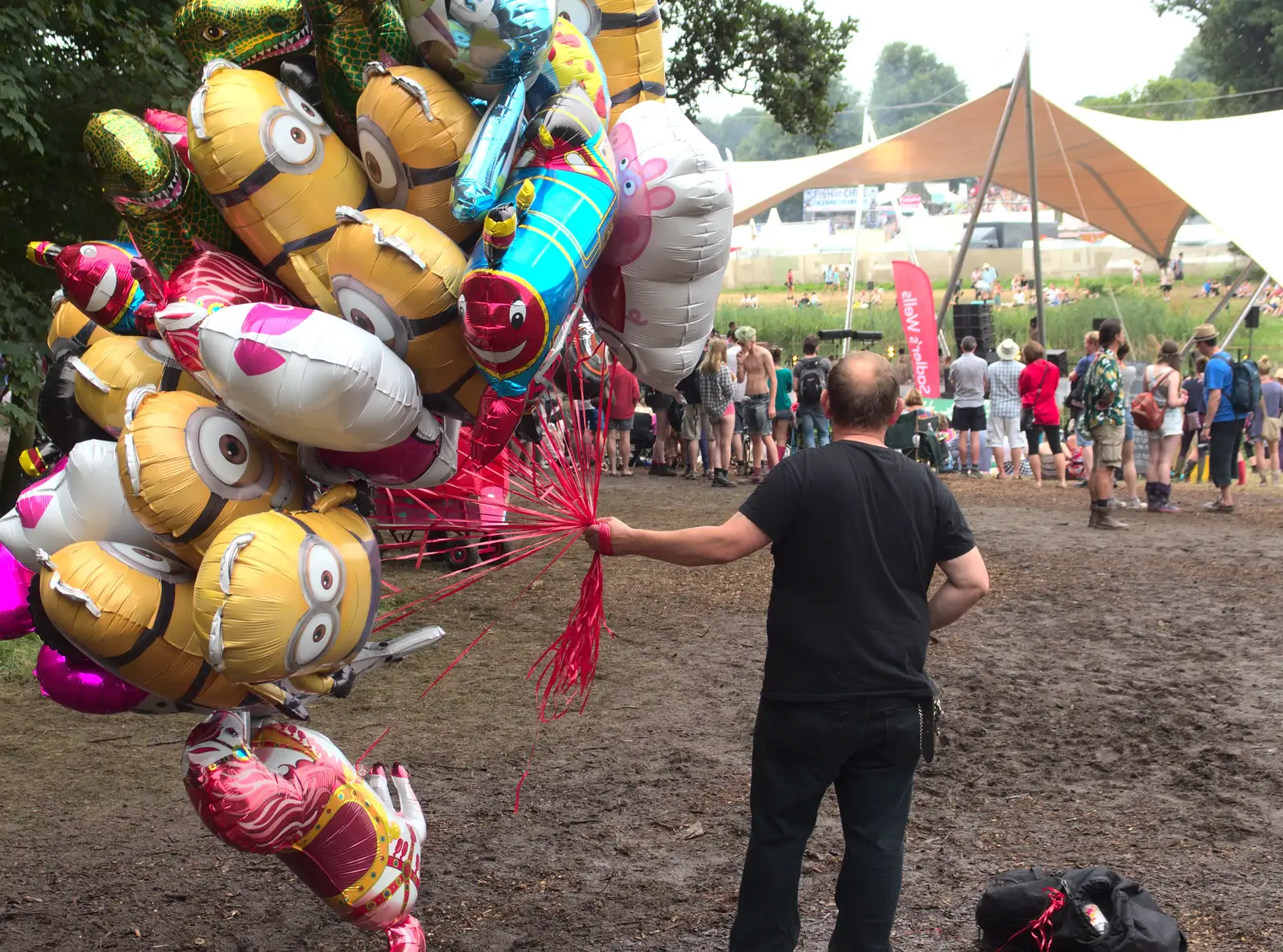 A bloke hauls balloons around, from Latitude Festival, Henham Park, Southwold, Suffolk - 17th July 2014