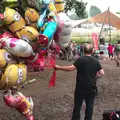 A bloke hauls balloons around, Latitude Festival, Henham Park, Southwold, Suffolk - 17th July 2014