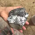 Fred holds out a lump of very shiny rock, Latitude Festival, Henham Park, Southwold, Suffolk - 17th July 2014