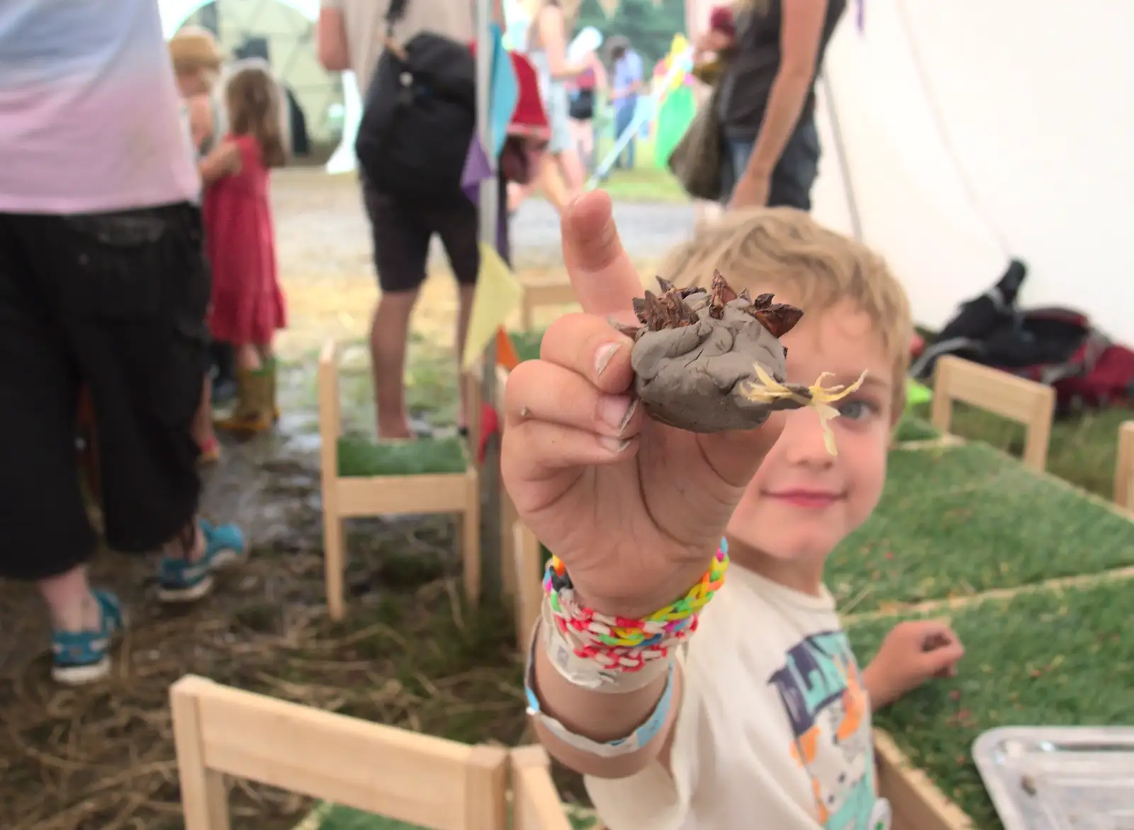 Fred shows off one of his 'making' creations, from Latitude Festival, Henham Park, Southwold, Suffolk - 17th July 2014