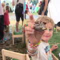 Fred shows off one of his 'making' creations, Latitude Festival, Henham Park, Southwold, Suffolk - 17th July 2014