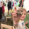 Fred shows off one of his 'making' creations, Latitude Festival, Henham Park, Southwold, Suffolk - 17th July 2014