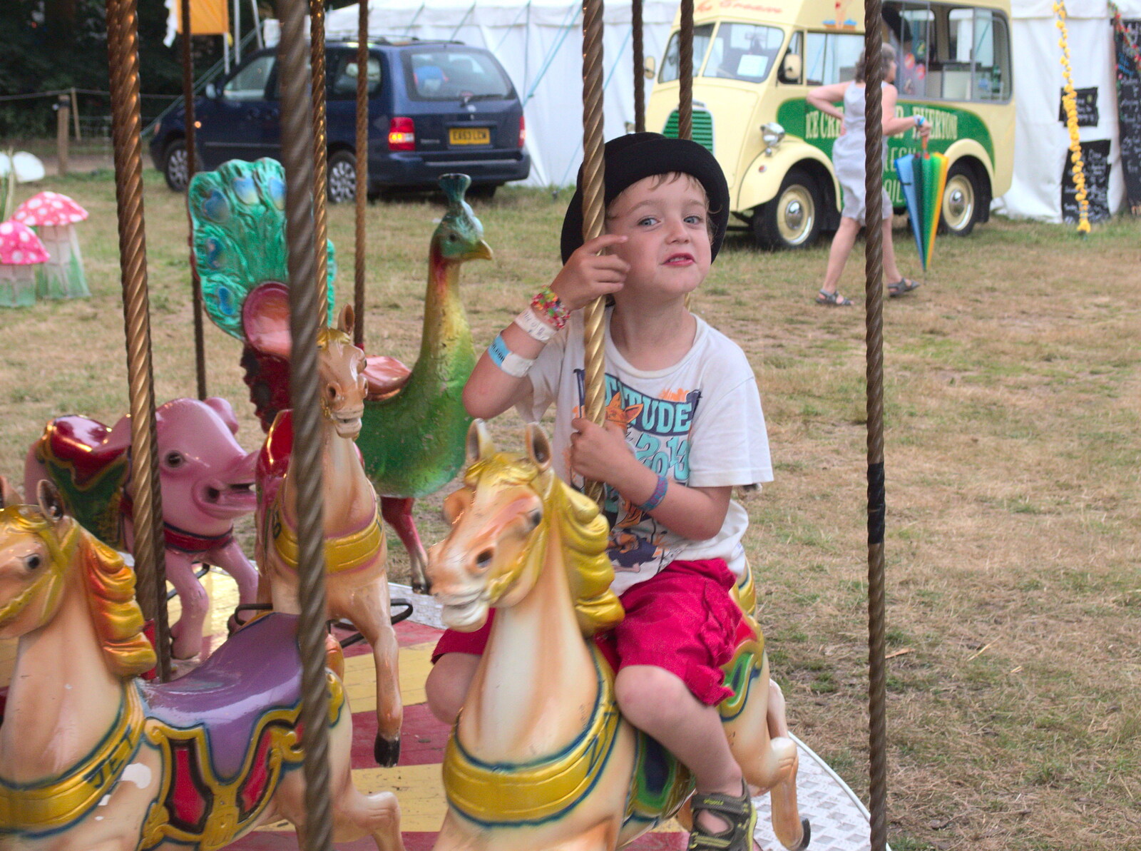 Fred on a carousel from Latitude Festival, Henham Park, Southwold, Suffolk - 17th July 2014