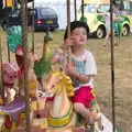 Fred on a carousel, Latitude Festival, Henham Park, Southwold, Suffolk - 17th July 2014