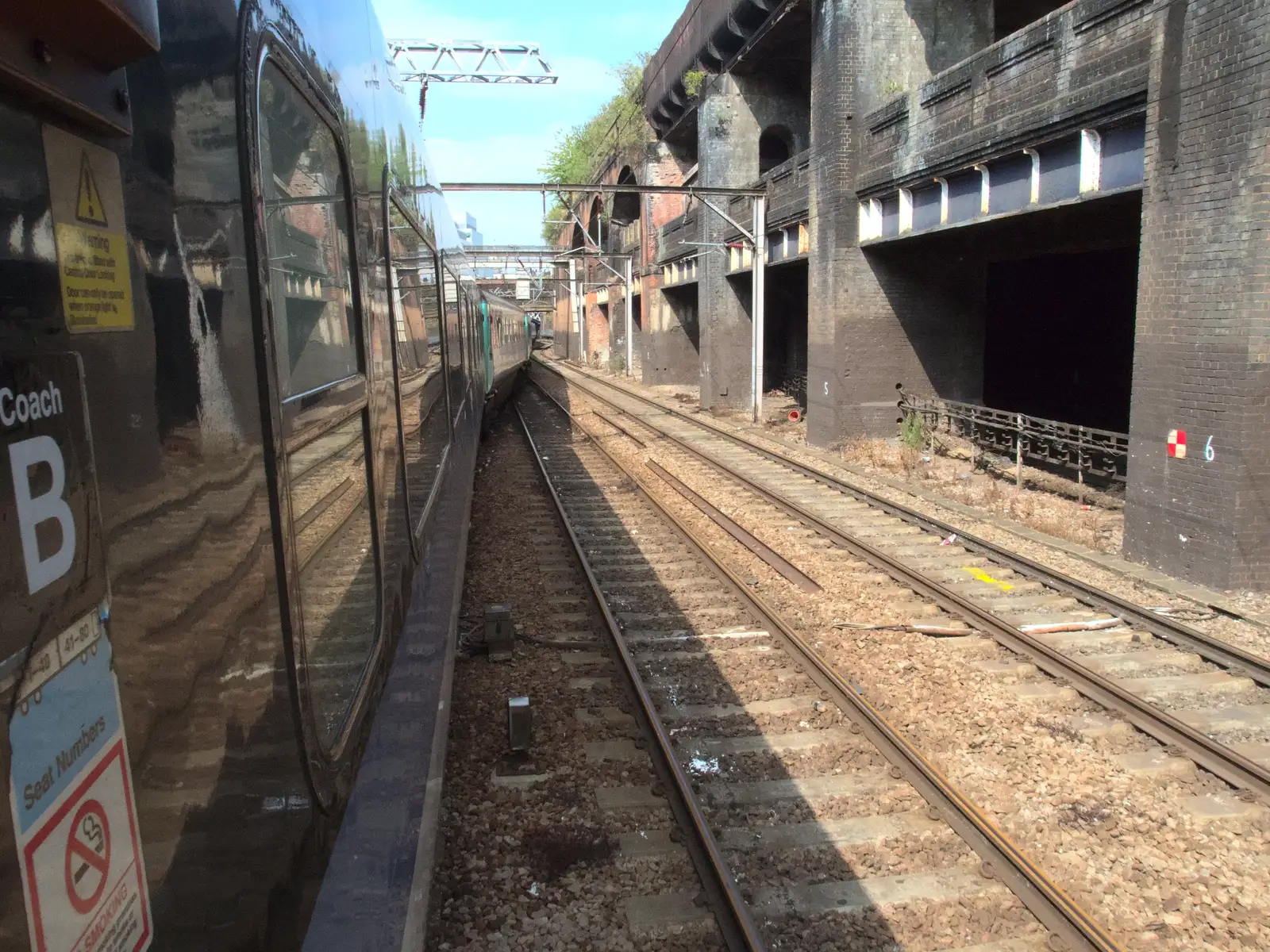 A view down the side of the train, from A Week on the Rails, Stratford and Liverpool Street, London - 23rd July