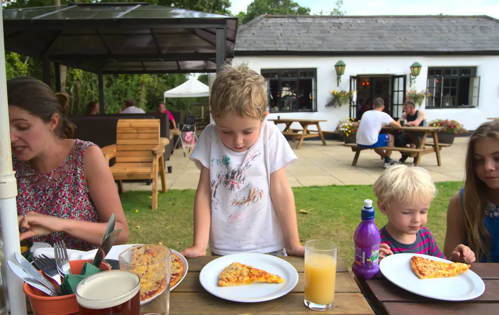 Fred's not sure about his pizza slice, from Bob and Bernice's 50th Wedding Anniversary, Hinton Admiral, Dorset - 25th July 2014