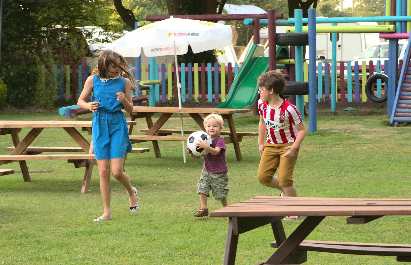 Harry's not quite got the idea of football, from Bob and Bernice's 50th Wedding Anniversary, Hinton Admiral, Dorset - 25th July 2014