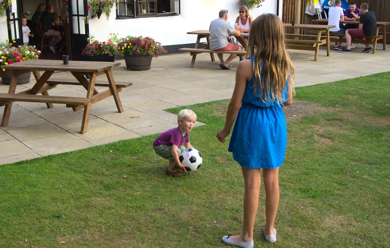 Harry picks up the football again, from Bob and Bernice's 50th Wedding Anniversary, Hinton Admiral, Dorset - 25th July 2014