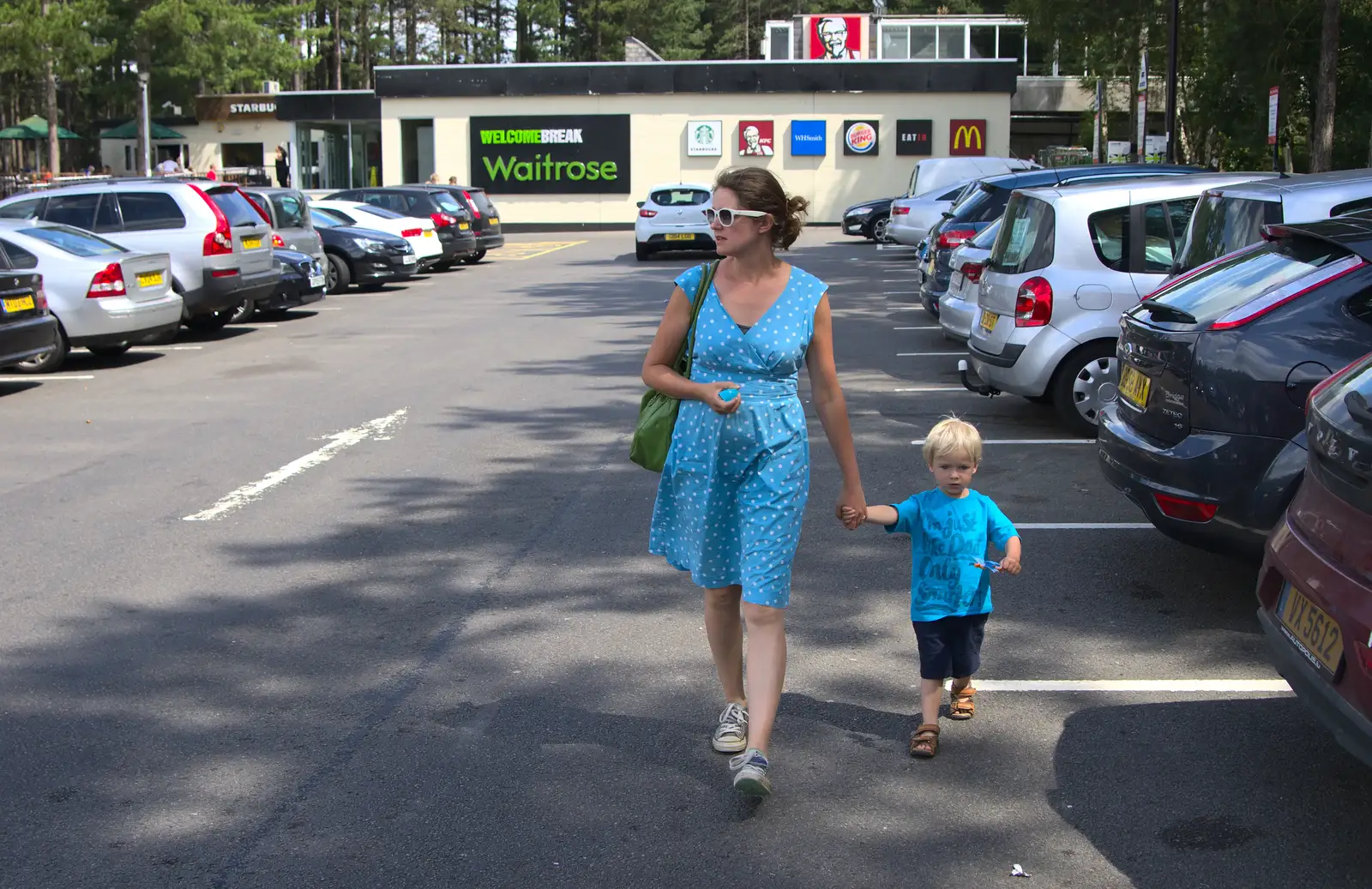 Isobel and Harry roam the car park of Fleet Services, from Bob and Bernice's 50th Wedding Anniversary, Hinton Admiral, Dorset - 25th July 2014