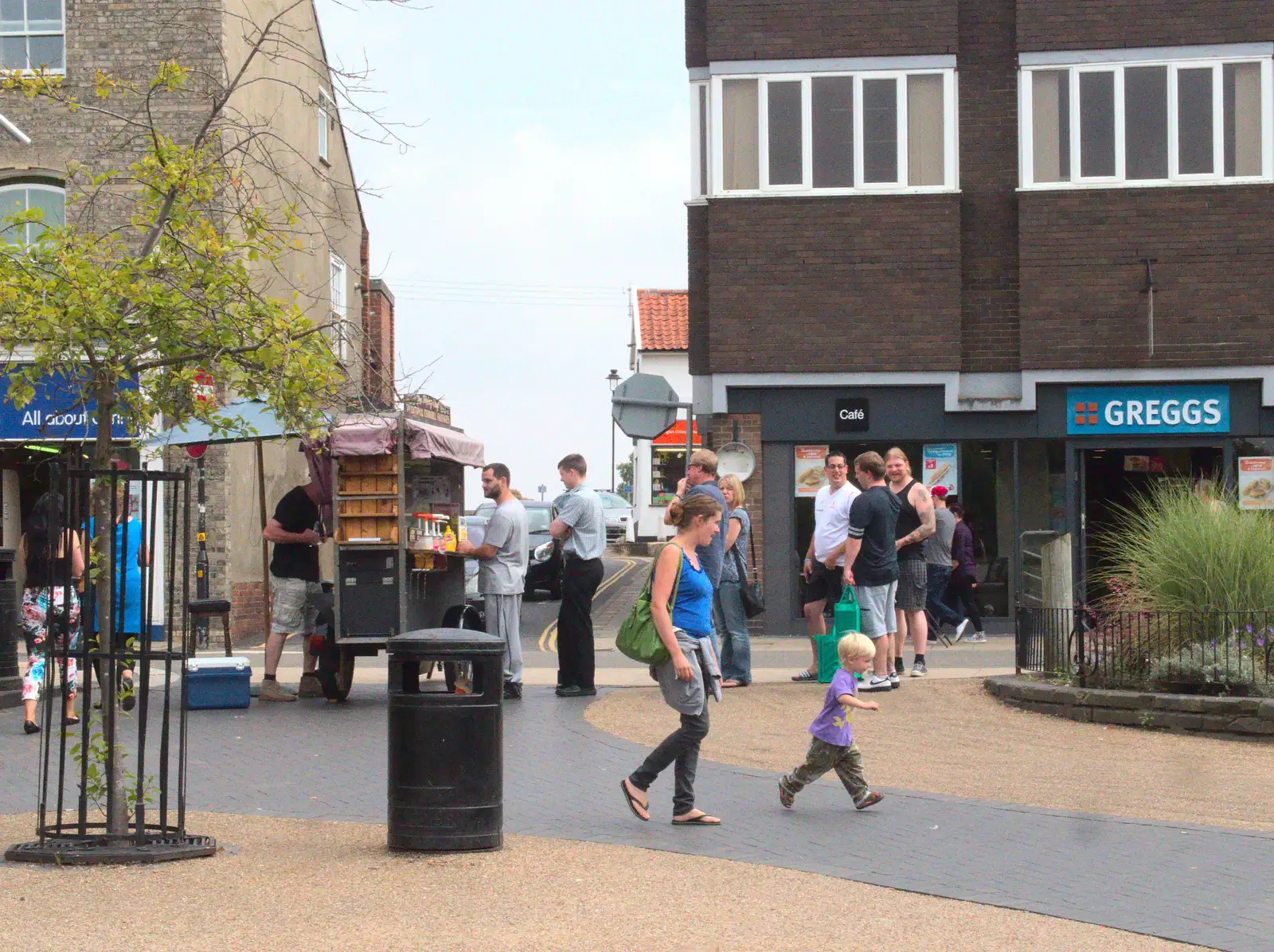 Harry legs it across the paving, from The BSCC at Harleston, and a Visit From Cambridge, Brome, Suffolk - 31st July 2014