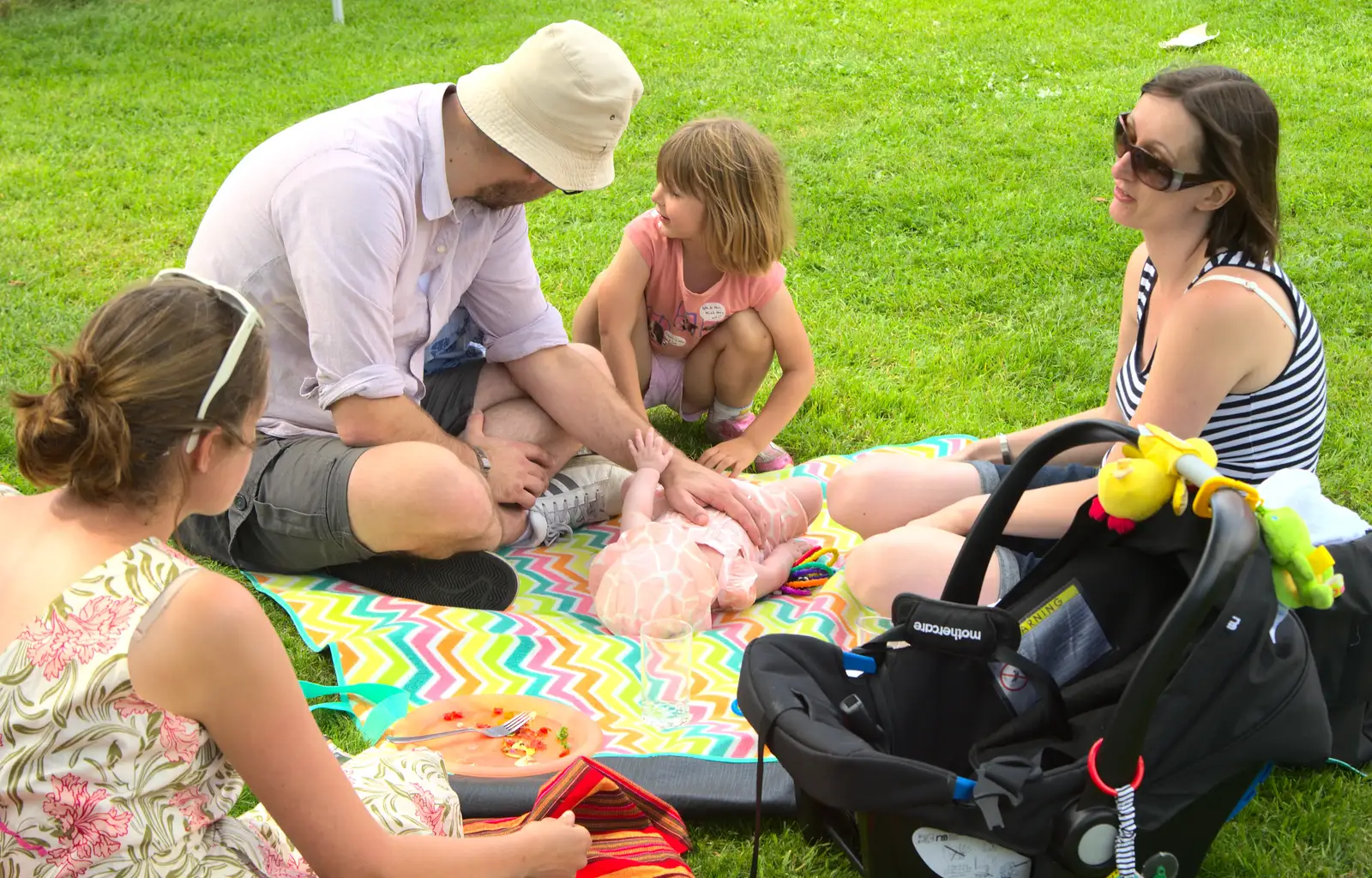 Matt and Emma's baby wriggles about, from The BSCC at Harleston, and a Visit From Cambridge, Brome, Suffolk - 31st July 2014