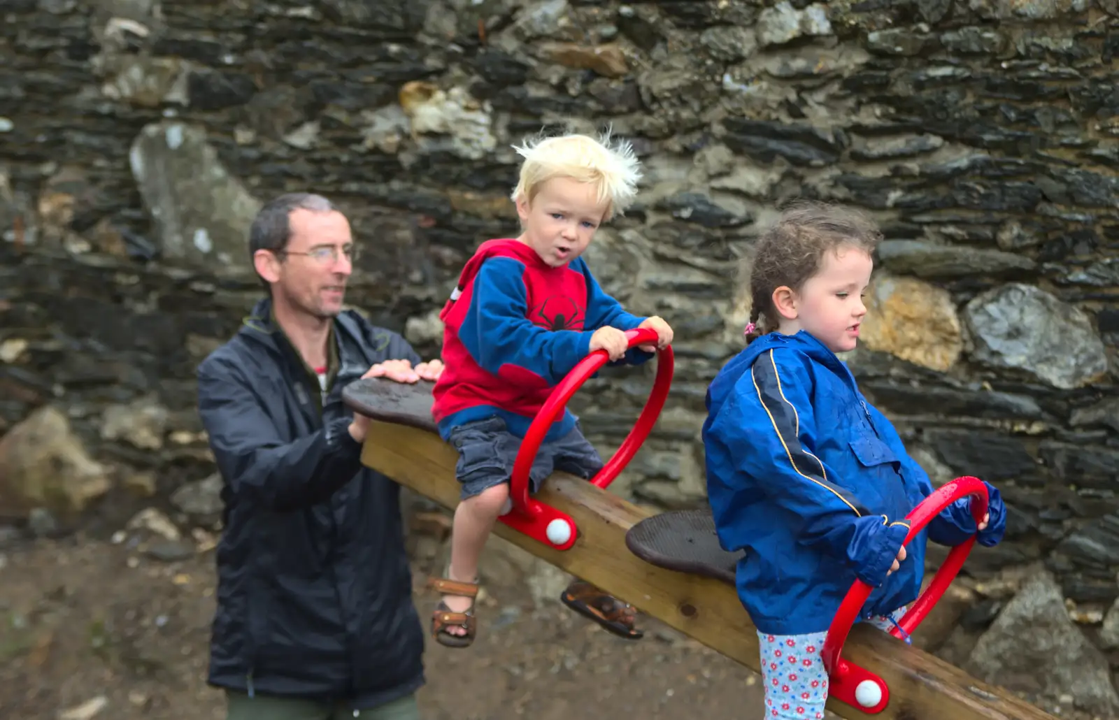 Harry gets bounced on the 'giants' see-saw, from Camping at Silver Strand, Wicklow, County Wicklow, Ireland - 7th August 2014