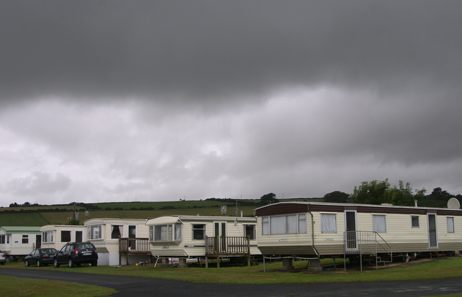 It's a bit dark over the static caravans from Camping at Silver Strand, Wicklow, County Wicklow, Ireland - 7th August 2014