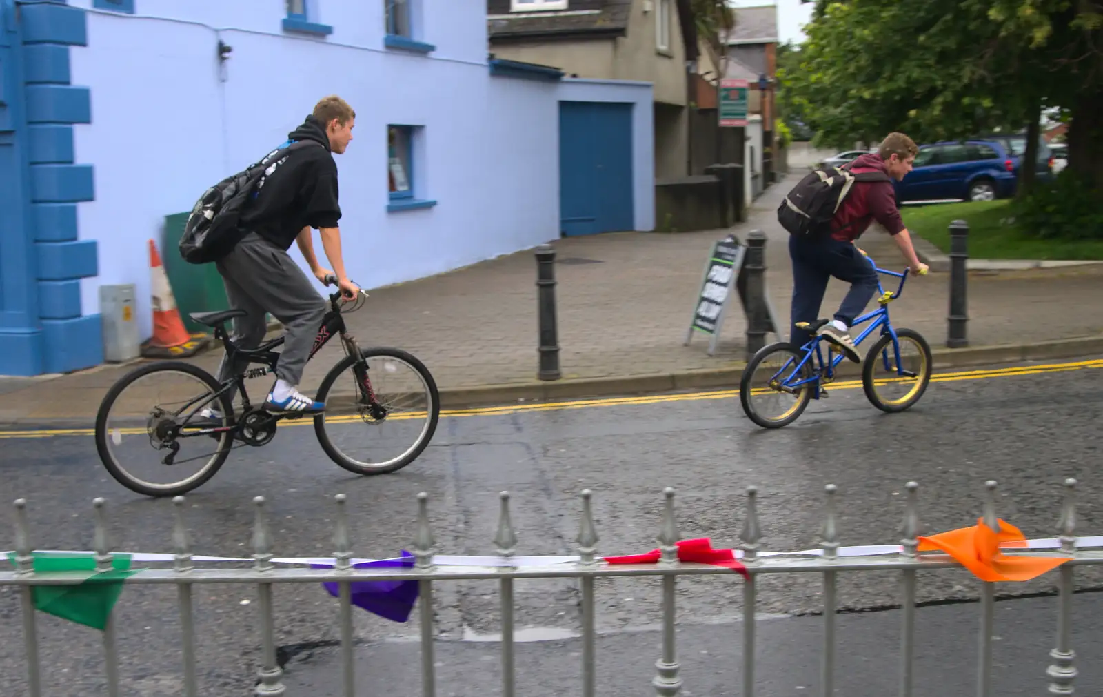 Two lads ride by, like a scene from Young Offenders, from Camping at Silver Strand, Wicklow, County Wicklow, Ireland - 7th August 2014