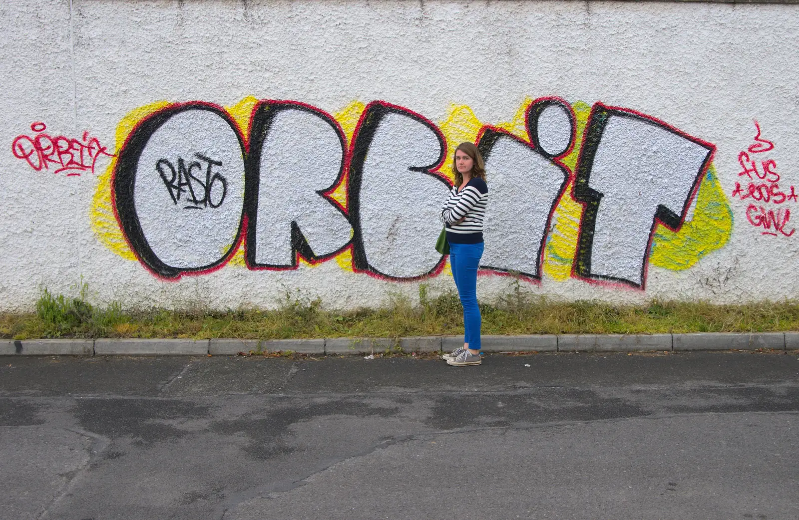 Isobel stands by some Orbit graffiti, from A Night Out in Dublin, County Dublin, Ireland - 9th August 2014