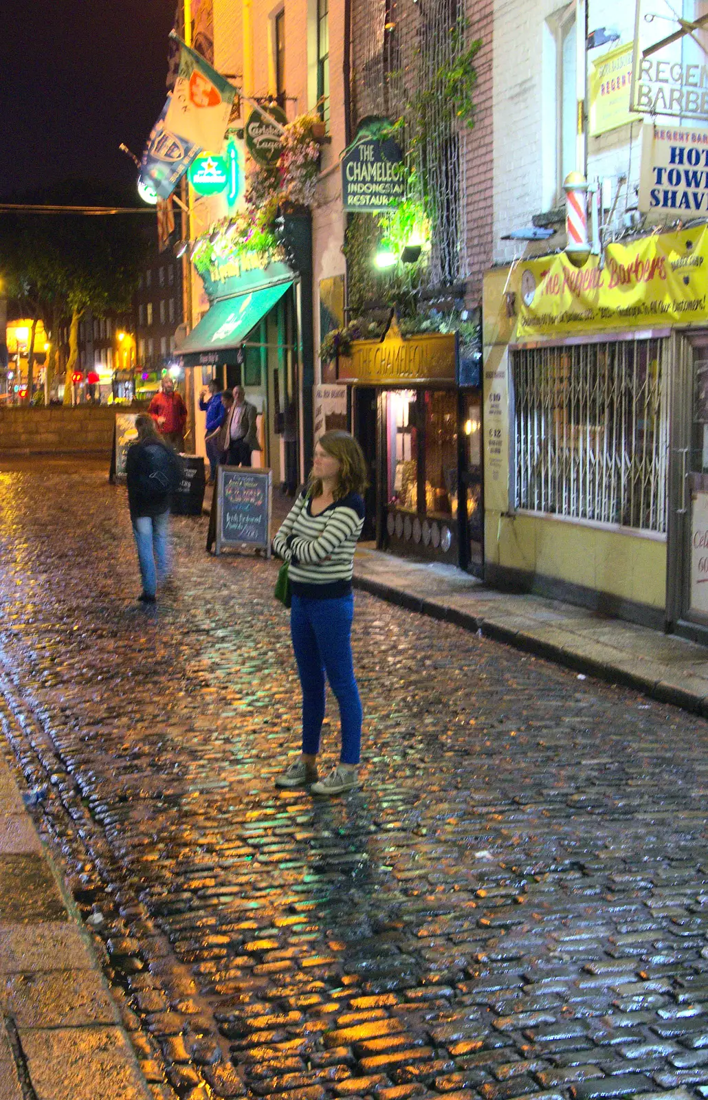 Isobel stands on wet cobbles on Regent Street, from A Night Out in Dublin, County Dublin, Ireland - 9th August 2014