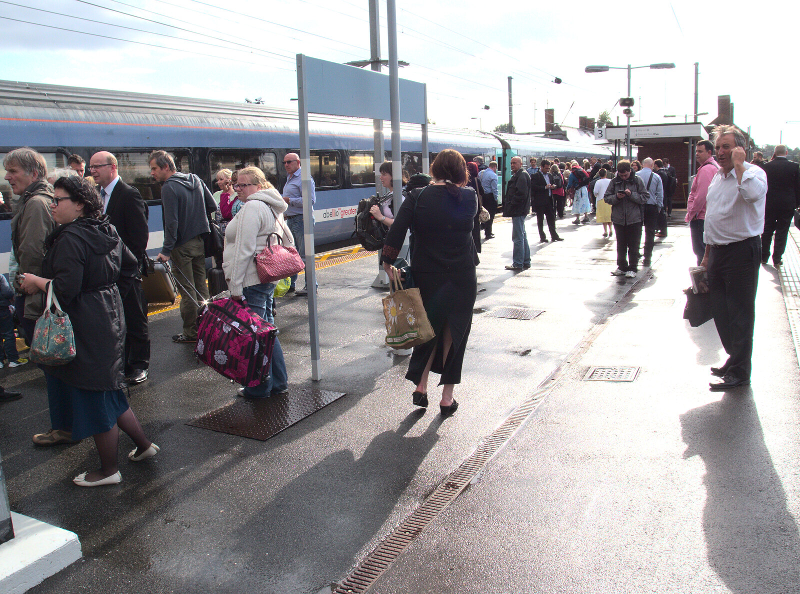 Hundreds of passengers mill around from Train Fails, and Pizza Pub, Manningtree and Southwark - 12th August 2014