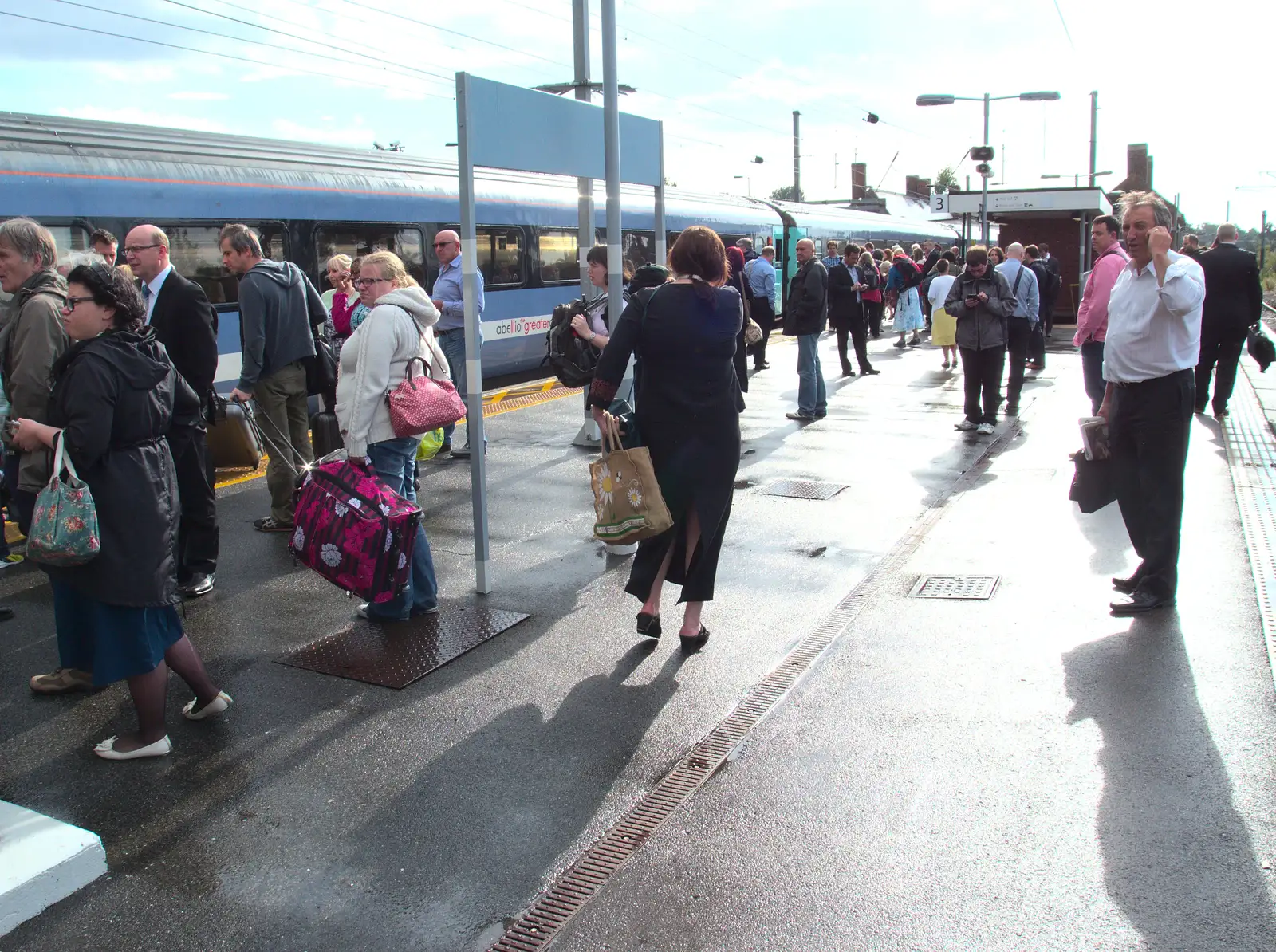 Hundreds of passengers mill around, from Train Fails, and Pizza Pub, Manningtree and Southwark - 12th August 2014