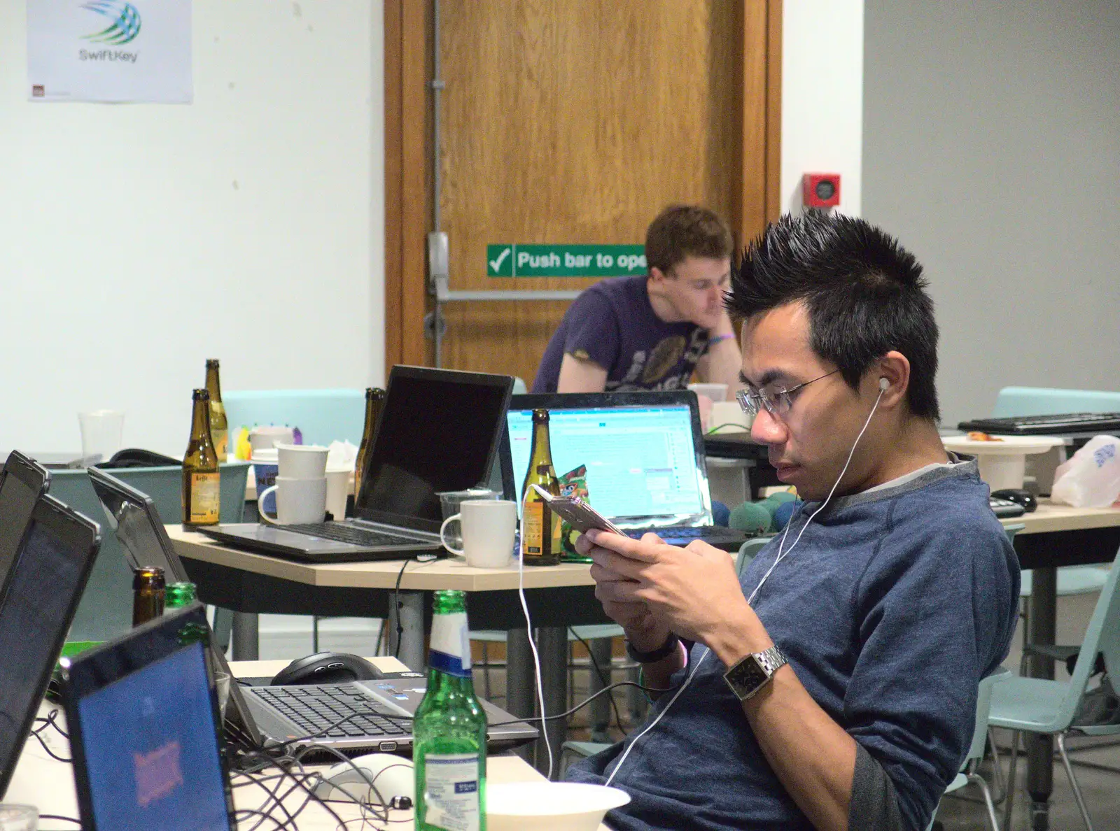 Ken listens to something on earphones, from SwiftKey Innovation Day, and Pizza Pub, Westminster and Southwark - 14th August 2014