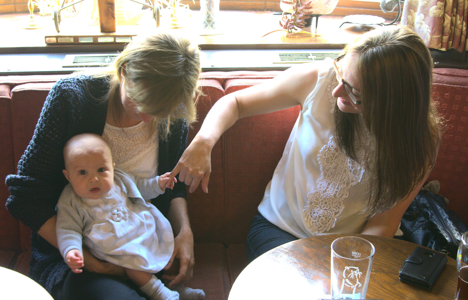 Martina and Suey get a go of Isabella from Matthew's Birthday up The Swan Inn, Brome, Suffolk - 17th August 2014