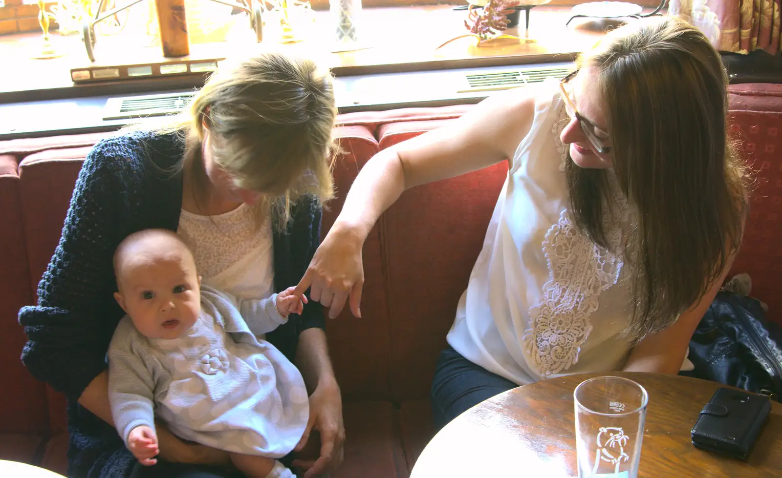 Martina and Suey get a go of Isabella, from Matthew's Birthday up The Swan Inn, Brome, Suffolk - 17th August 2014