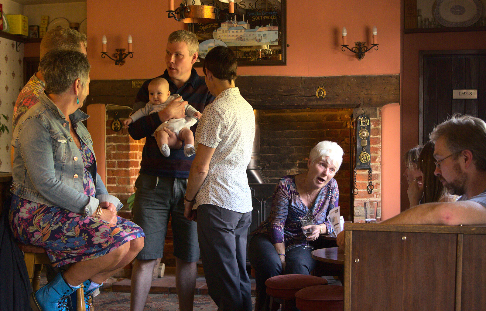 Billy Boy holds up his daughter from Matthew's Birthday up The Swan Inn, Brome, Suffolk - 17th August 2014