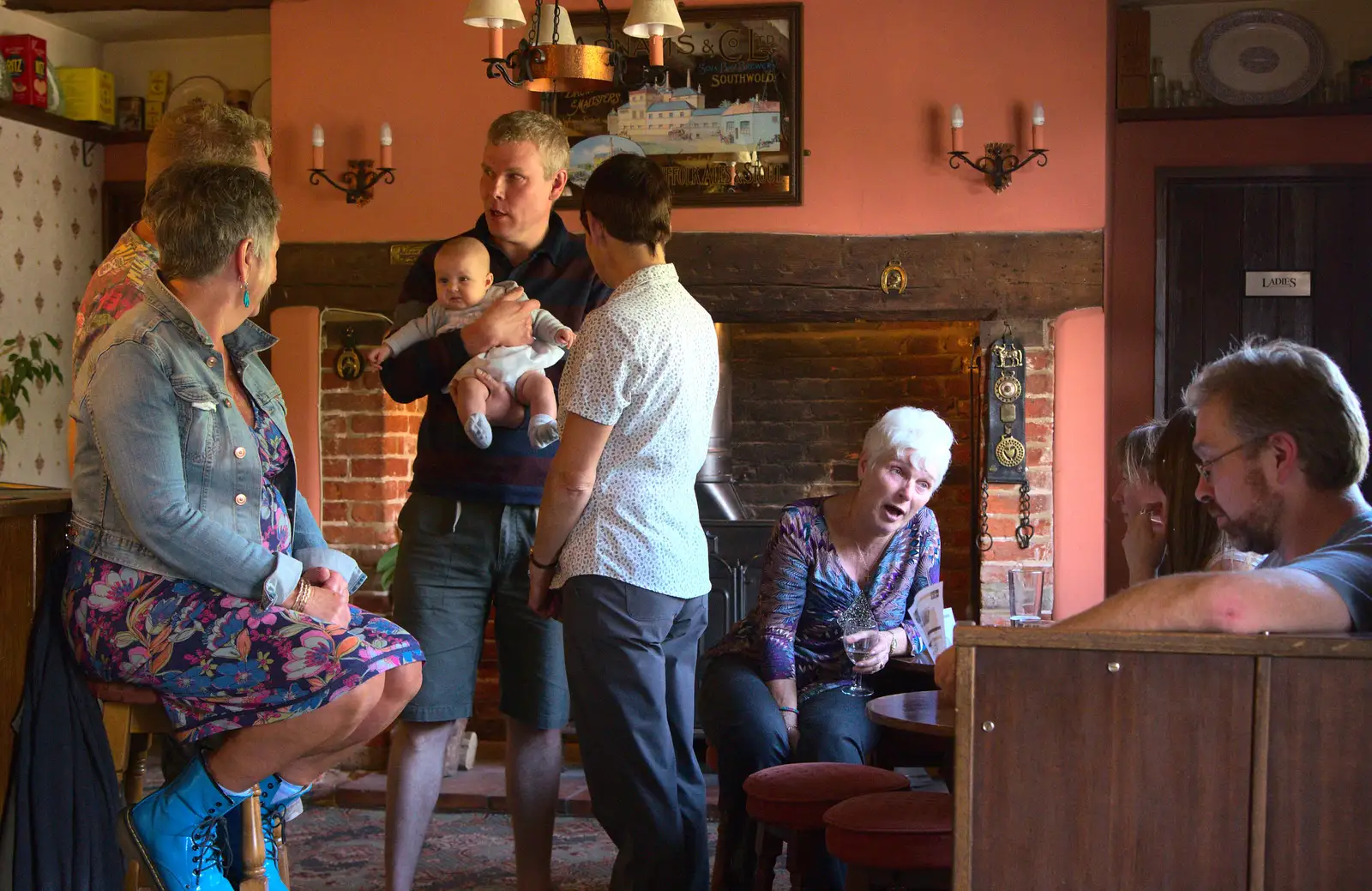 Billy Boy holds up his daughter, from Matthew's Birthday up The Swan Inn, Brome, Suffolk - 17th August 2014