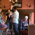 Billy Boy holds up his daughter, Matthew's Birthday up The Swan Inn, Brome, Suffolk - 17th August 2014