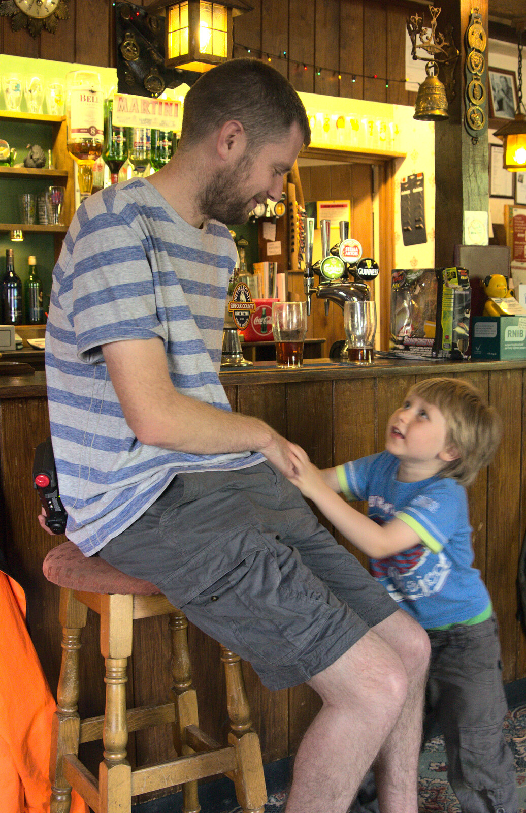 Oak pesters Phil for a bit from Matthew's Birthday up The Swan Inn, Brome, Suffolk - 17th August 2014