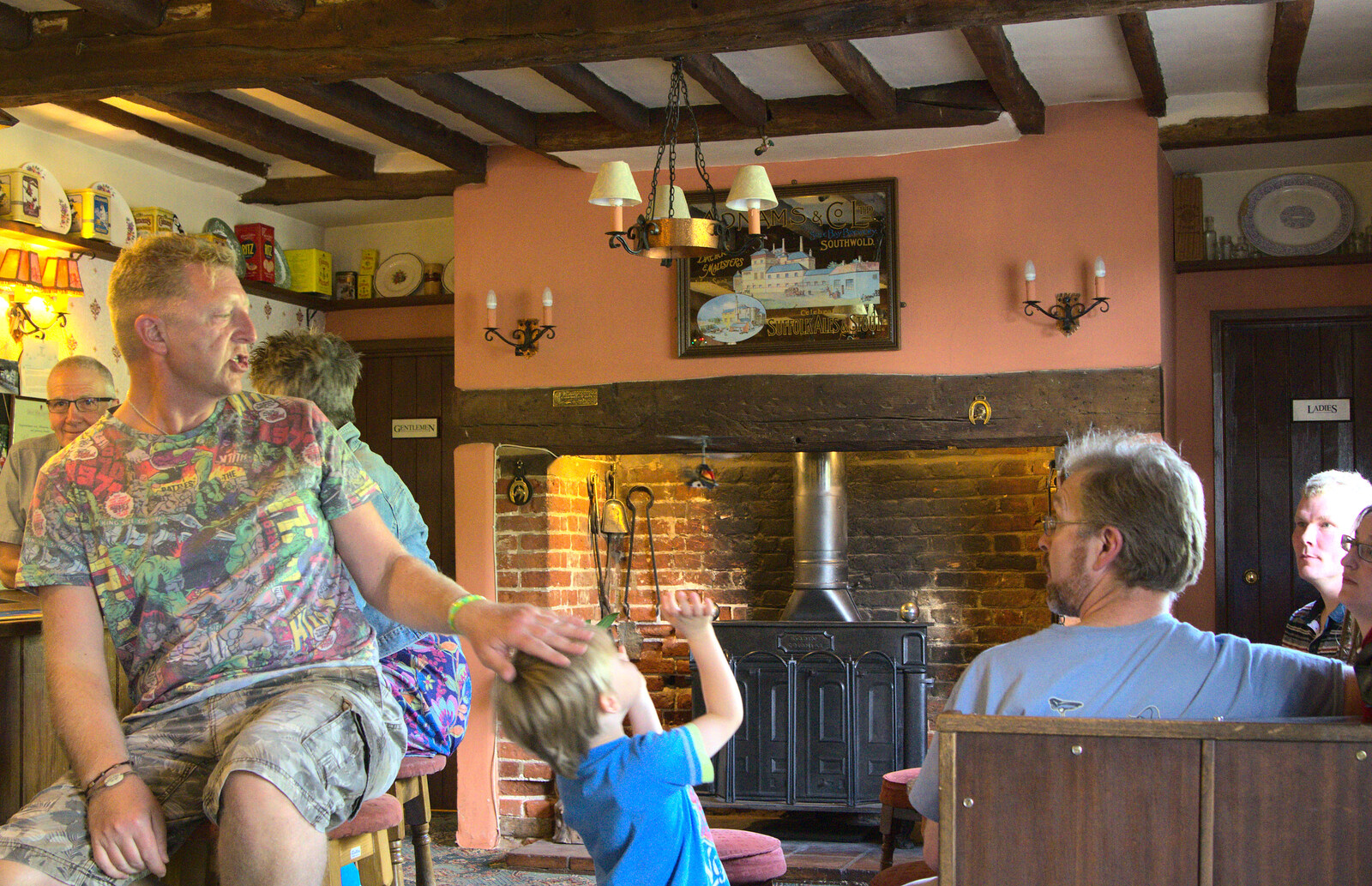 Gaz pats Oak on the head from Matthew's Birthday up The Swan Inn, Brome, Suffolk - 17th August 2014