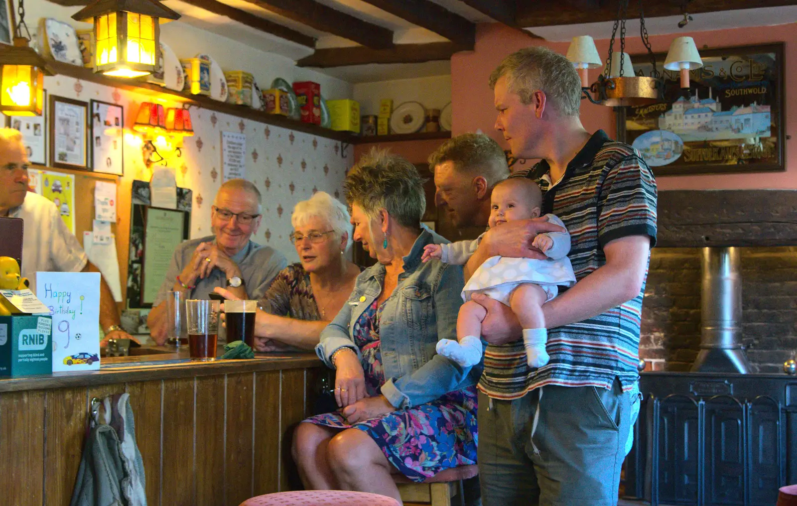 Bill brings Isabella to the bar, from Matthew's Birthday up The Swan Inn, Brome, Suffolk - 17th August 2014